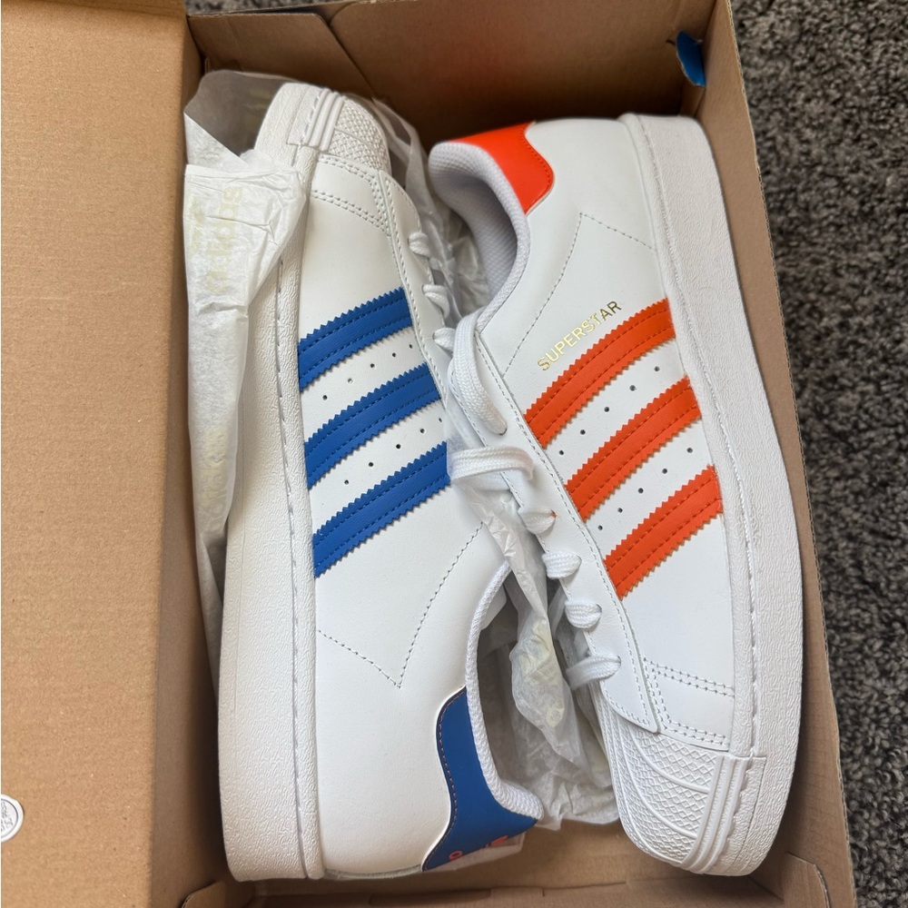 Adidas Superstar White Sneakers with Blue and Orange Accents